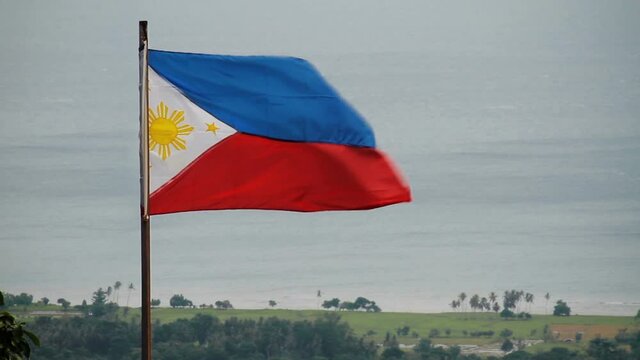 Philippines National flag flying in the wind, Philippines