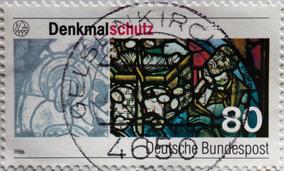 GERMANY - CIRCA 1986  : a postage stamp from Germany, showing restored glass painting in Regensburg Cathedral. Monument protection