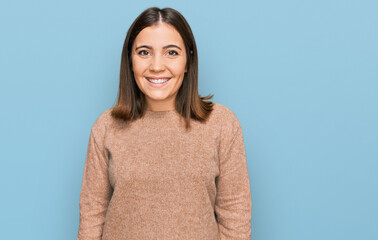 Obraz premium Young beautiful woman wearing casual clothes with a happy and cool smile on face. lucky person.