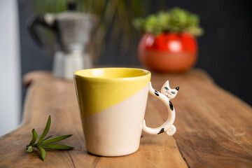 coffee with colorful ceramic mug on wooden table