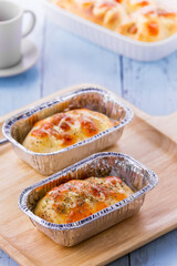 Mini pizza with sausage and cheese