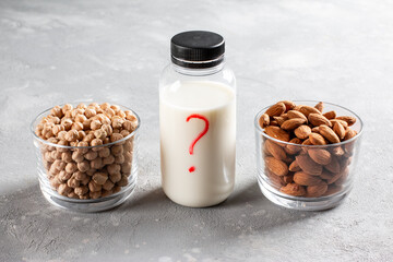 Alternative types of milks. Chickpea or almond milk? Vegan food concept. Non dairy milk