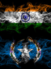 India, Indian vs Northern Mariana Islands smoky mystic flags placed side by side. Thick colored silky abstract smoke flags.