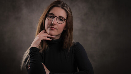 Young pretty woman in her mid 20s - portrait shot - studio photography