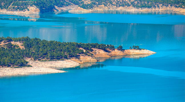 Panoramic view of Ermenek Dam and lake on a sunny day - Konya, Turkey © muratart