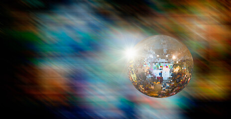 Obraz na płótnie Canvas Party disco mirror ball reflecting colorful lights 