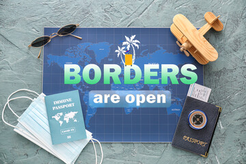 Travel supplies, medical masks and immune passport on color background