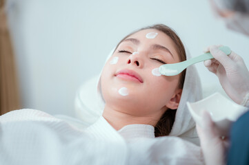 Cosmetic procedure to rejuvenate the skin and remove wrinkles for a young beautiful girl. Cosmetology