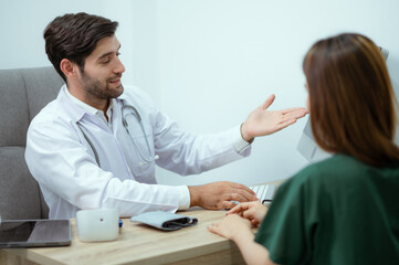 Fototapeta premium Doctor who specializes in cosmetic surgery is giving advice on how to improve the beauty of the face. And enhancing breasts and good proportions