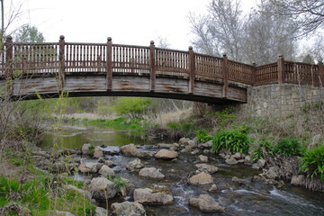 Curved bridge over a stream