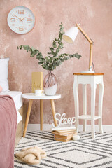 Bedside tables in interior of stylish room