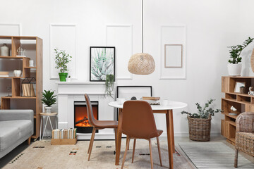 Fototapeta na wymiar Interior of modern dining room with fireplace