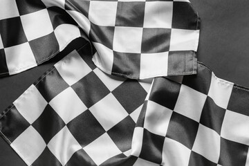 Racing flags on dark background