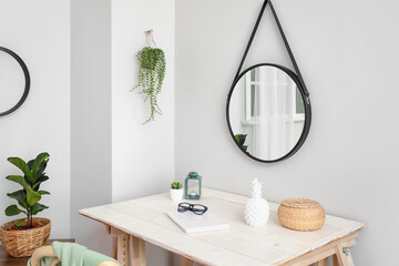 Interior of stylish workplace with mirror