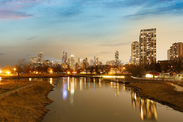 Chicago skyline after sunset showing Chicago downtown. Chicago, on Lake Michigan in Illinois, is among the largest cities in the U.S. 