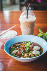 stewed Beef noodle soup, Noodle soup thai style put blood in the soup hot for mellow soup (Pork or Beef) on wooden table