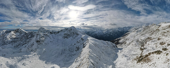 peak of the mountain view, partially cloudy day, italian alps