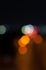 Abstract bokeh nightlight and blur car light bokeh on street background.