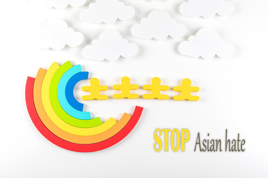 Writing Stop Asian Hate With Rainbow On White Background. Hate Crimes Against Asians. Virus Has No Nationality. Concept Of End Racism.