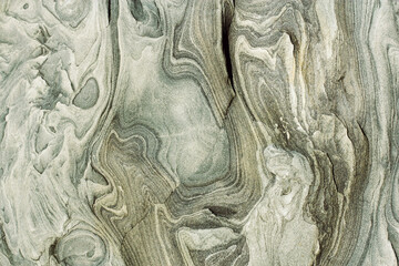 abstract wavy gray and white lines on the stone