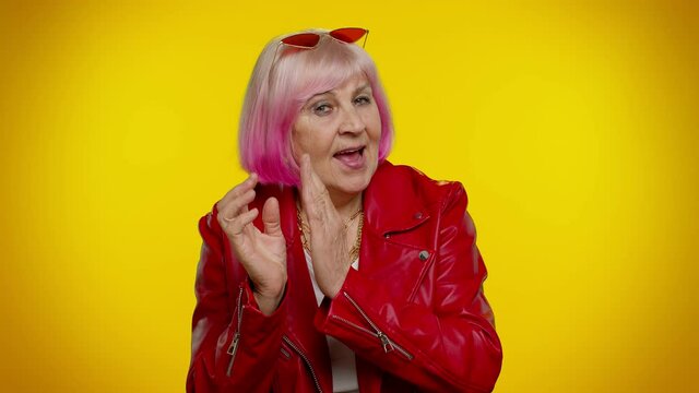 Villain idea. Cunning sneaky rocker mature granny woman with tricky face conspiring scheming, thinking over tricky plan with cunning expression, pondering revenge, evil joke prank. Senior grandmother