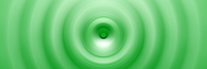 Abstract round green background. Circles from the center point. Image of diverging circles. Rotation that creates circles.