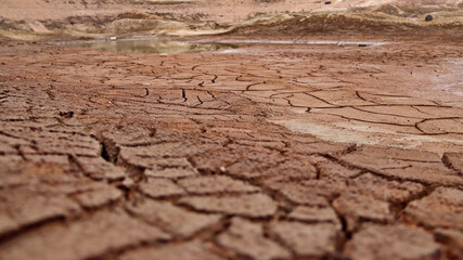 Cracked land at the bottom of a dried-up lake