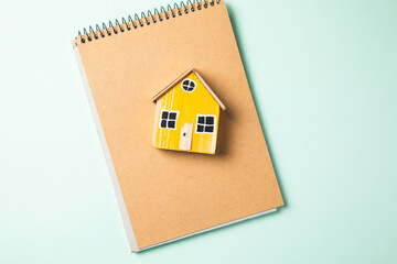 house model on notebook on the table