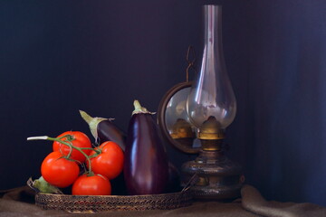 Rustic arrangement with  tomatoes and eggplants 