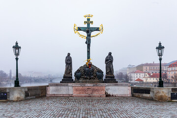 early morning Charles Bridge in Prague is a famous Czech monument