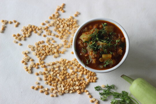 One Pot Chickpea Lentil Dish Cooked With Bottle Gourd Onions Tomatoes And Spices