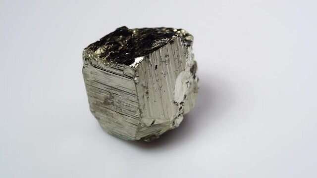 natural silver pyrite gemstone on the white turning table