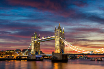 Tower Bridge illuminated at dusk, London, England 