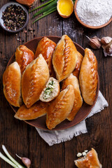 mini pie with green onion and egg. rustic style