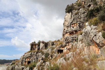 ancient monumental lycian rock-cut tombs in archaeological site Myra near Demre, Turkey