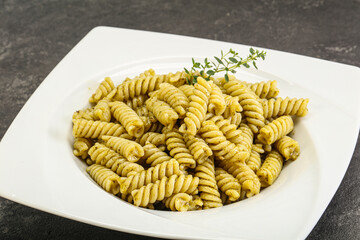 Italian pasta Fusilli with pesto