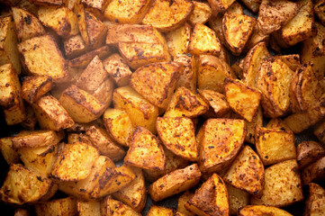 Fried potatoes with seasoning. Recently cooked hot