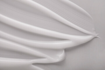 Cosmetic cream milk texture white colored background