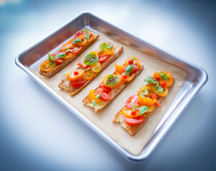metal tray with veggie toasts