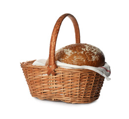 Fresh rye bread in basket on white background