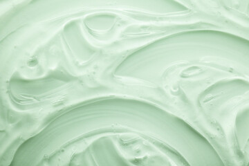 Cream gel green transparent cosmetic sample texture with bubbles background