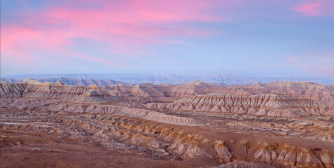 Panorama of Earth Forest National Geopark and Himalayas at sunset in Ngari prefecture, Western Tibet, China