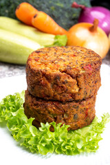 Round vegetarian patties or burgers made from grains, vegetables and legumes