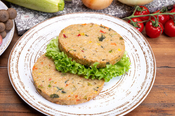 Round vegetarian patties or burgers made from grains, vegetables and legumes