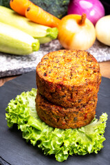 Round vegetarian patties or burgers made from grains, vegetables and legumes