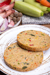 Round vegetarian patties or burgers made from grains, vegetables and legumes