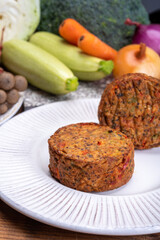 Round vegetarian patties or burgers made from grains, vegetables and legumes