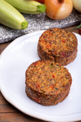 Round vegetarian patties or burgers made from grains, vegetables and legumes