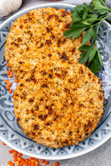 Healthy vegetarian or vegan food, meat free burger made from orange lentils legumes