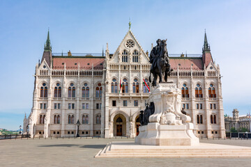 Fototapeta premium Hungarian Parliament building and statue of Gyvla Andrassy, Budapest, Hungary